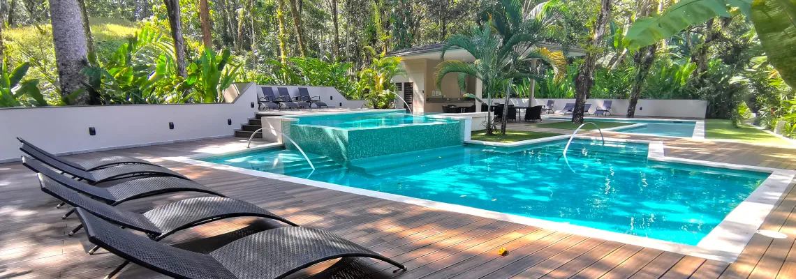 Swimming pool in the rainforest at Private Villas Travel Pioneers